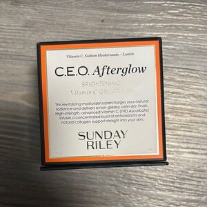 Sunday Riley C.E.O. Afterglow Moisturizer - Orange and White